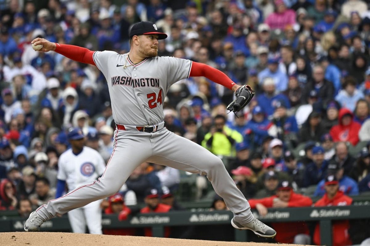 Mar 26, 2026; Chicago, Illinois, USA; Washington Nationals pitcher Cade Cavalli (24) throws against the Chicago Cubs during the first inning at Wrigley Field. Mandatory Credit: Matt Marton-Imagn Images