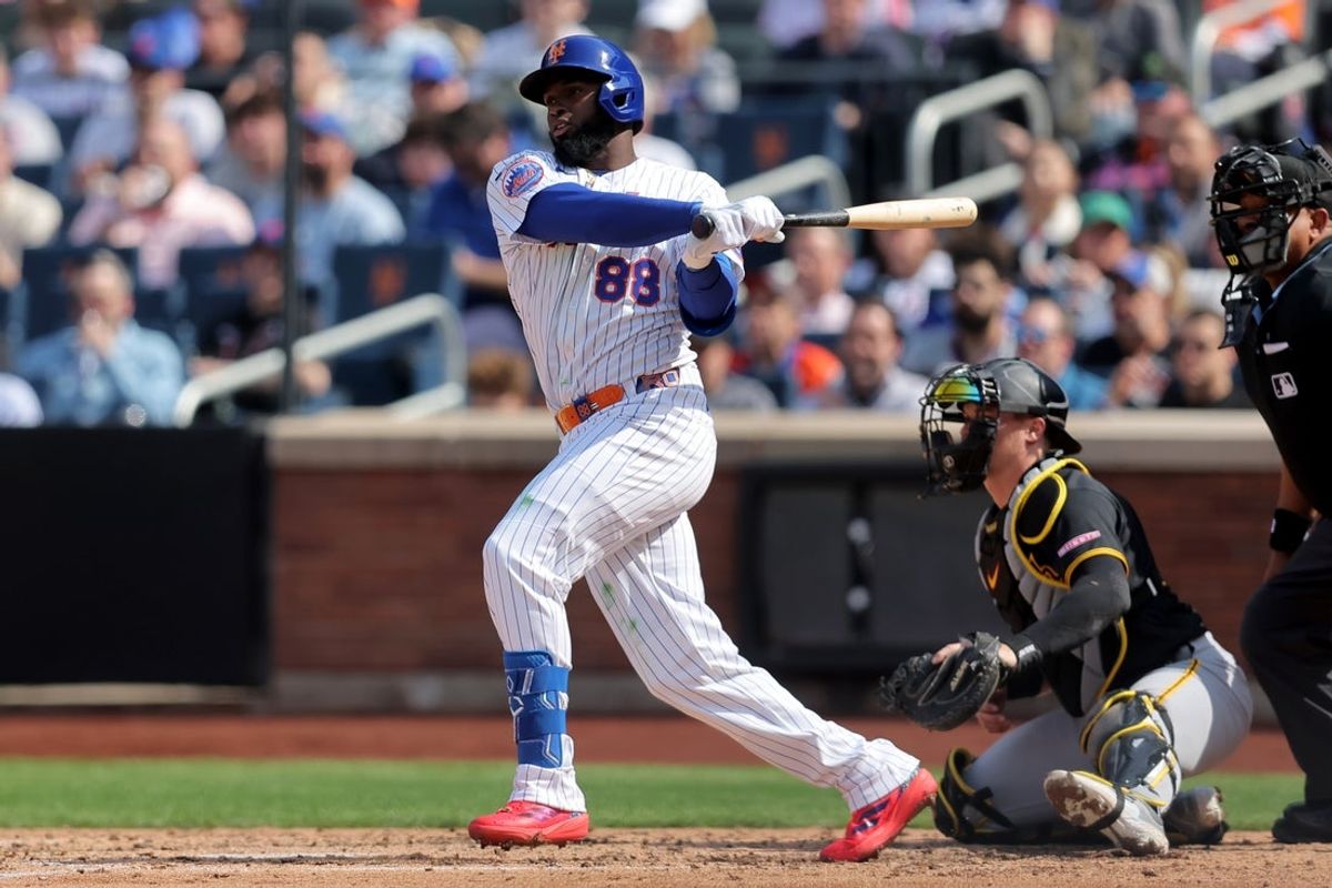 Mar 26, 2026; New York City, New York, USA; New York Mets center fielder Luis Robert Jr. (88) follows through on an RBI single against the Pittsburgh Pirates during the fourth inning at Citi Field. Mandatory Credit: Brad Penner-Imagn Images