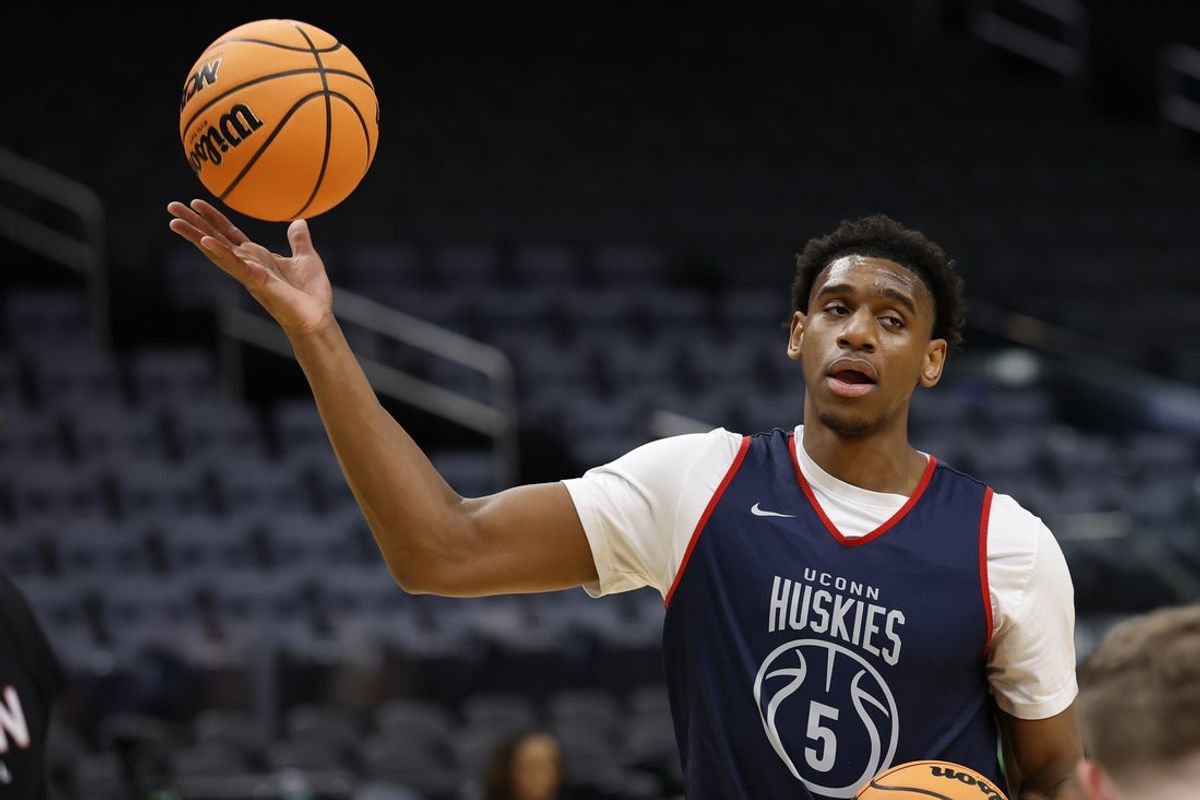 UConn Huskies forward Tarris Reed Jr. (5) grabs a ball during a practice session ahead of the east regional of the men's 2026 NCAA Tournament at Capital One Arena. Mandatory Credit: Geoff Burke-Imagn Images
