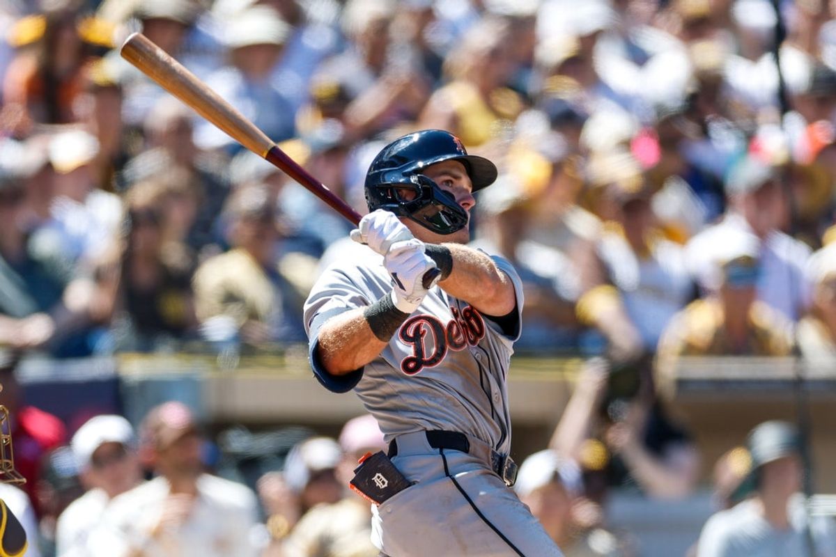 Mar 26, 2026; San Diego, California, USA; Detroit Tigers third baseman Kevin McGonigle (7) hits a double during the third inning against the San Diego Padres at Petco Park. Mandatory Credit: David Frerker-Imagn Images