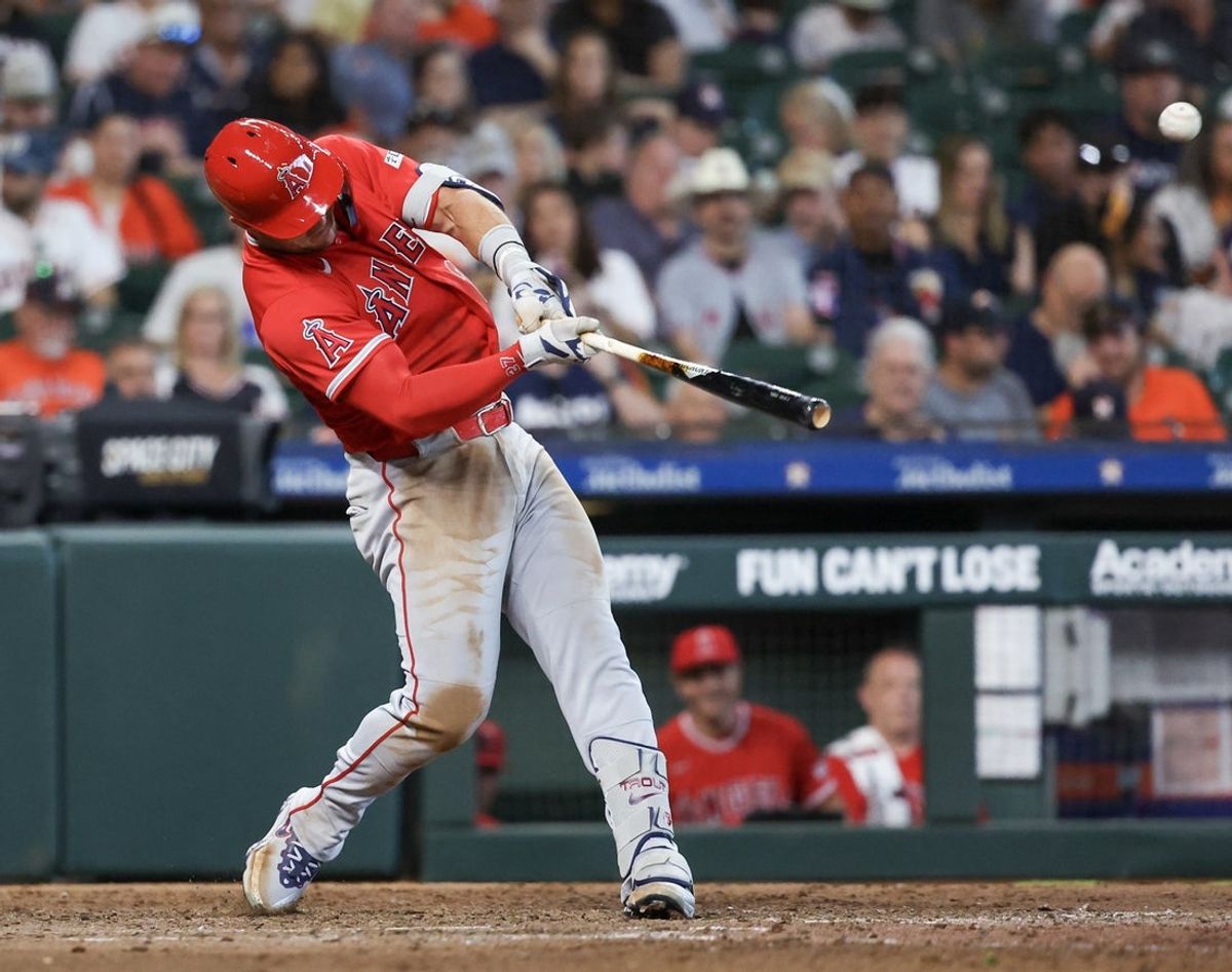 Mar 26, 2026; Houston, Texas, USA;  Los Angeles Angels right fielder Mike Trout (27) hits a home run against the Houston Astros in the seventh inning at Daikin Park. Mandatory Credit: Thomas Shea-Imagn Images