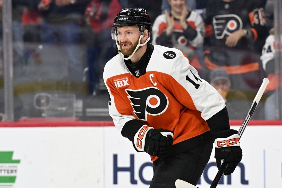 Mar 26, 2026; Philadelphia, Pennsylvania, USA; Philadelphia Flyers center Sean Couturier (14) reacts after scoring a goal against the Chicago Blackhawks during the first period at Xfinity Mobile Arena. Mandatory Credit: Eric Hartline-Imagn Images