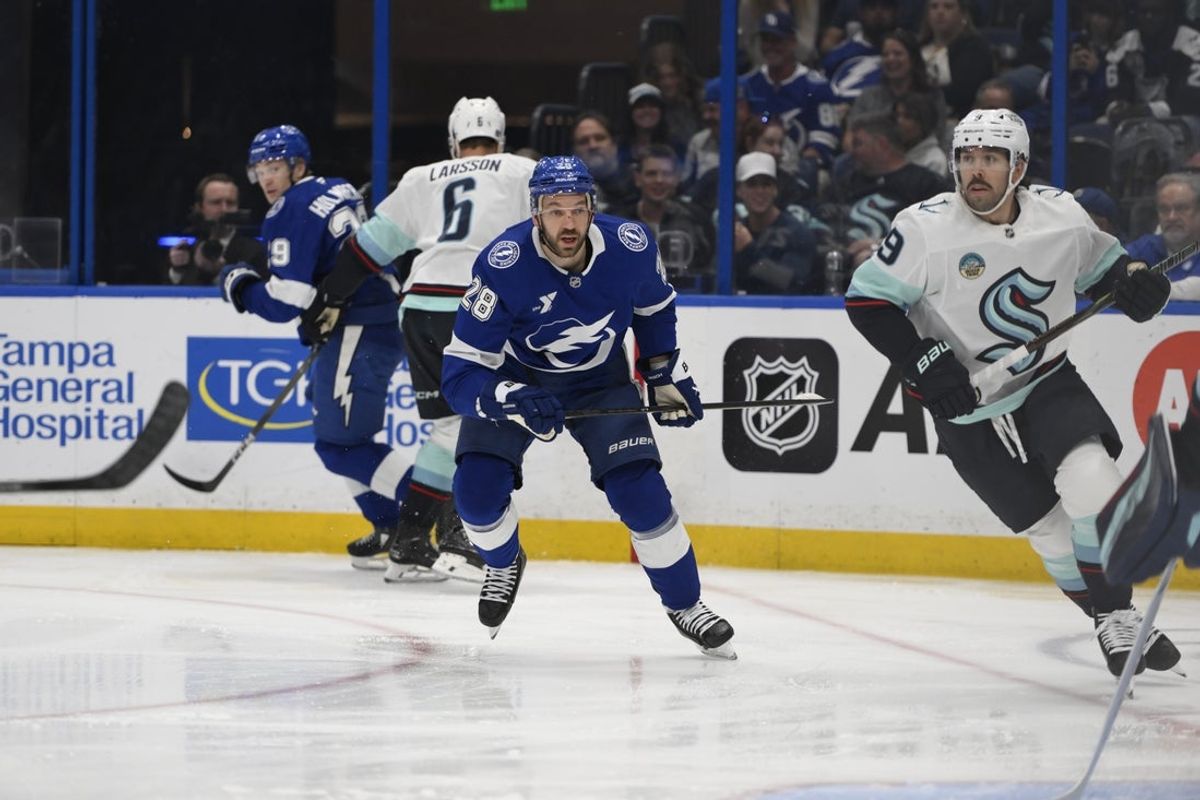 Mar 26, 2026; Tampa, Florida, USA; Tampa Bay Lightning center Zemgus Girgenson (28) skates against Seattle Kraken during the first period at Benchmark International Arena. Mandatory Credit: Pablo Robles-Imagn Images
