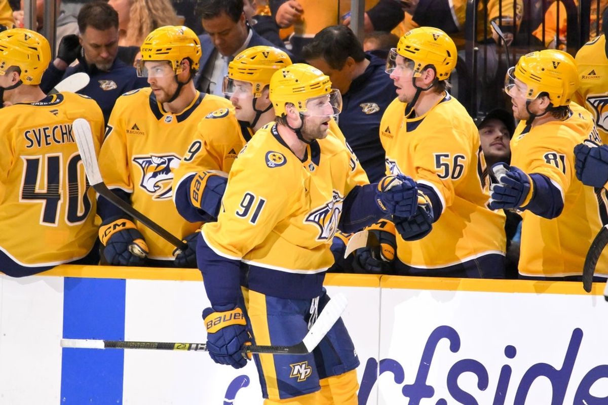 Mar 26, 2026; Nashville, Tennessee, USA;  Nashville Predators center Steven Stamkos (91) celebrates with his teammates after scoring a goal against the New Jersey Devils during the second period at Bridgestone Arena. Mandatory Credit: Steve Roberts-Imagn Images