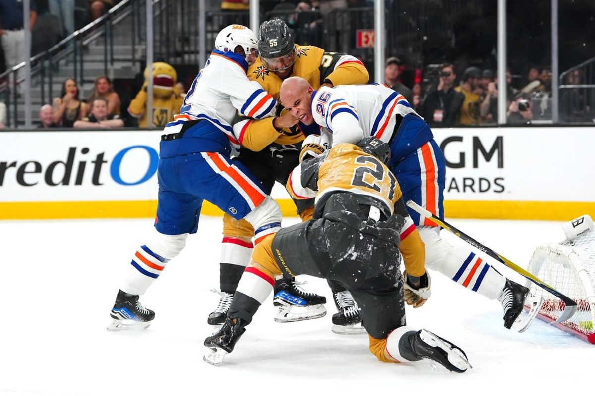 Mar 26, 2026; Las Vegas, Nevada, USA; Vegas Golden Knights right wing Keegan Kolesar (55) and center Brett Howden (21) get into an altercation with Edmonton Oilers right wing Kasperi Kapanen (42) and defenseman Darnell Nurse (25) at the end of the firs period at T-Mobile Arena. Mandatory Credit: Stephen R. Sylvanie-Imagn Images