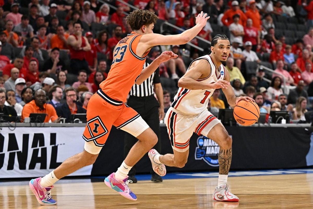 Mar 26, 2026; Houston, TX, USA; Houston Cougars guard Milos Uzan (7) dribbles the ball against the Illinois Fighting Illini in the first half during a Sweet Sixteen game of the South Regional of the men's 2026 NCAA Tournament at Toyota Center. Mandatory Credit: Maria Lysaker-Imagn Images