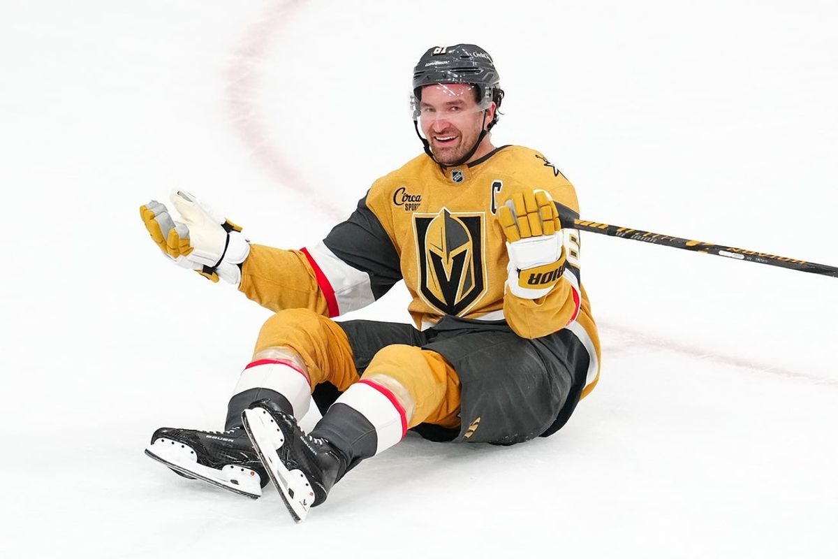 Mar 26, 2026; Las Vegas, Nevada, USA; Vegas Golden Knights right wing Mark Stone (61) reacts after being taken down by Edmonton Oilers left wing Zach Hyman (18) during an overtime period at T-Mobile Arena. Mandatory Credit: Stephen R. Sylvanie-Imagn Images