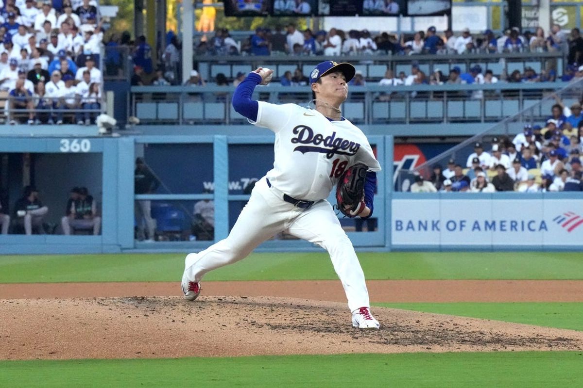 Mar 26, 2026; Los Angeles, California, USA; Los Angeles Dodgers pitcher Yoshinobu Yamamoto (18) throws against the Arizona Diamondbacks at Dodger Stadium. Mandatory Credit: Kirby Lee-Imagn Images