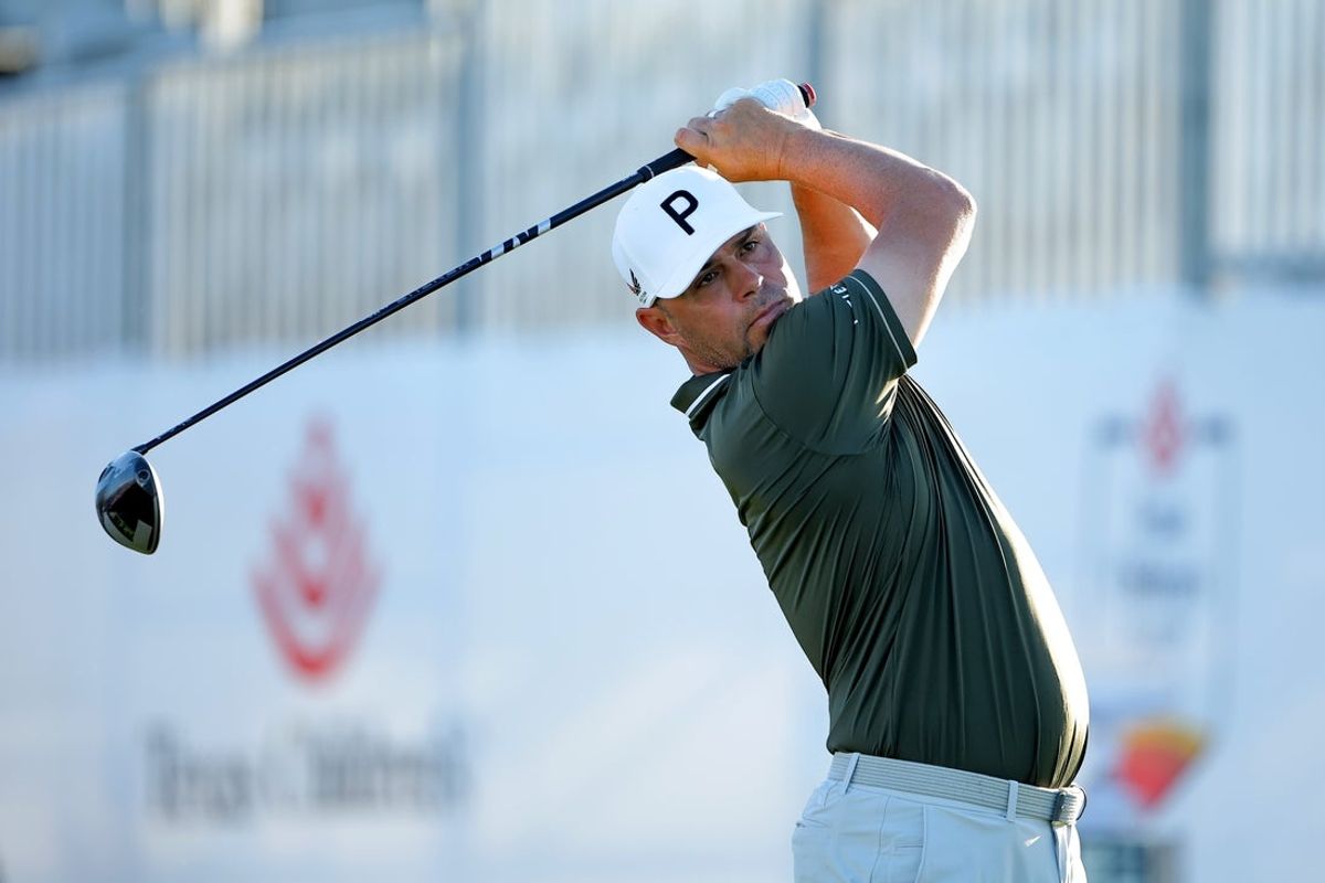 Mar 27, 2026; Houston, Texas, USA; Gary Woodland hits a tee shot on the first hole during the second round of the Texas Children's Houston Open golf tournament. Mandatory Credit: Erik Williams-Imagn Images