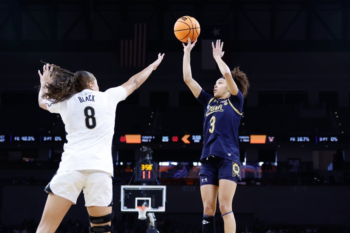 Mar 27, 2026; Fort Worth, TX, USA;  Notre Dame Fighting Irish guard Hannah Hidalgo (3) shoots as Vanderbilt Commodores forward Ava Black (8) defends during the first half at Dickies Arena. Mandatory Credit: Chris Jones-Imagn Images