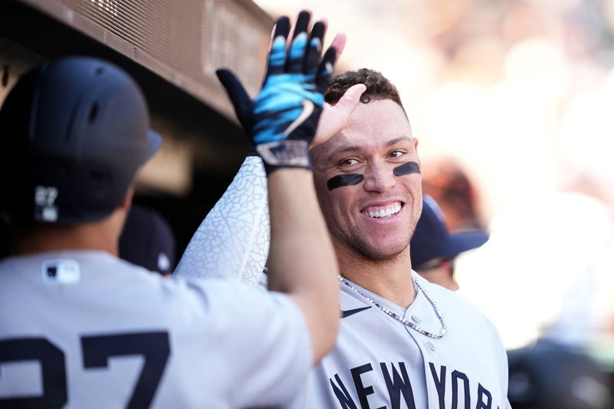Mar 27, 2026; San Francisco, California, USA; New York Yankees designated hitter Giancarlo Stanton (left) is congratulated by right fielder Aaron Judge (right) after hitting a home run against the San Francisco Giants during the sixth inning at Oracle Park. Mandatory Credit: Darren Yamashita-Imagn Images