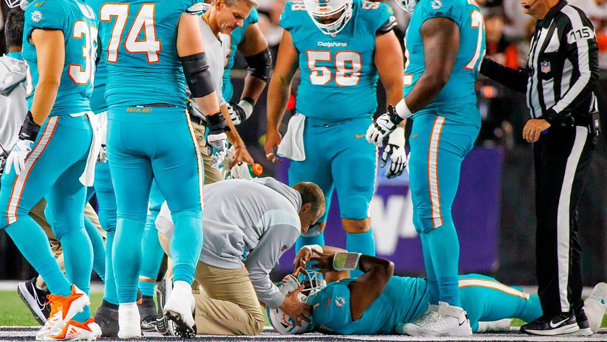 Miami Dolphins quarterback Tua Tagovailoa is attended by medical staff after being sacked by Cincinnati Bengals defensive tackle Josh Tupou on Thursday, Sept. 29, 2022, in Cincinnati,