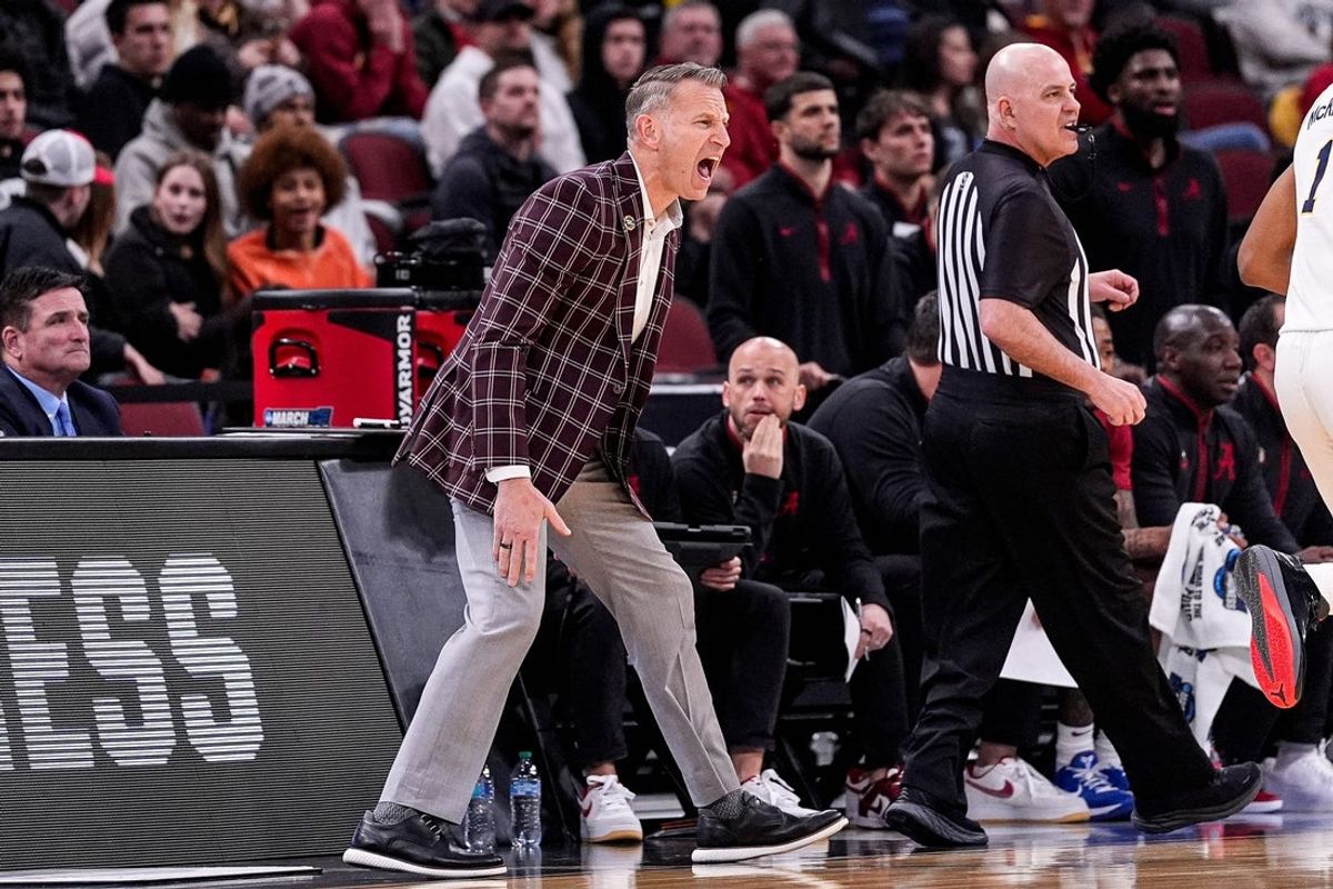 Alabama head coach Nate Oats reacts to a play against Michigan during the first half of NCAA Tournament Sweet 16 round at United Center in Chicago on Friday, March 27, 2026.