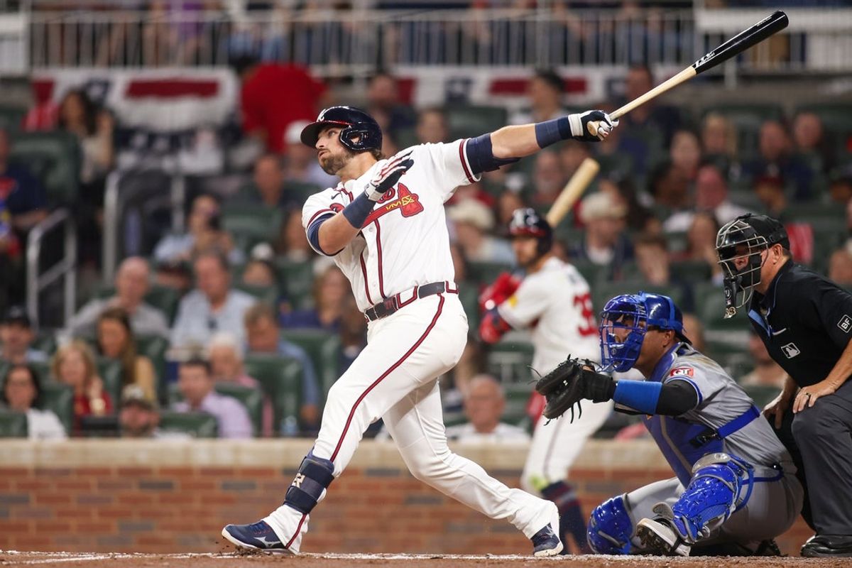 Mar 27, 2026; Atlanta, Georgia, USA; Atlanta Braves third baseman Austin Riley (27) hits a single against the Kansas City Royals in the third inning at Truist Park. Mandatory Credit: Brett Davis-Imagn Images