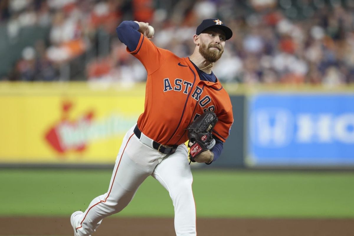 Mar 27, 2026; Houston, Texas, USA; Houston Astros starting pitcher Mike Burrows (50) delivers a pitch during the second inning against the Los Angeles Angels at Daikin Park. Mandatory Credit: Troy Taormina-Imagn Images