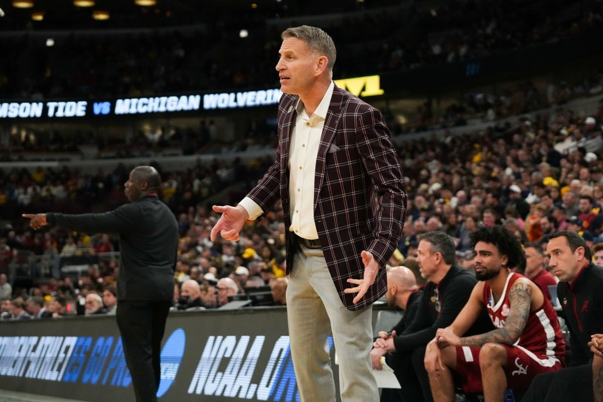 Mar 27, 2026; Chicago, IL, USA; Alabama Crimson Tide head coach Nate Oats looks on in the second half against the Michigan Wolverines during a Sweet Sixteen game of the Midwest Regional of the men's 2026 NCAA Tournament at United Center. Mandatory Credit: David Banks-Imagn Images