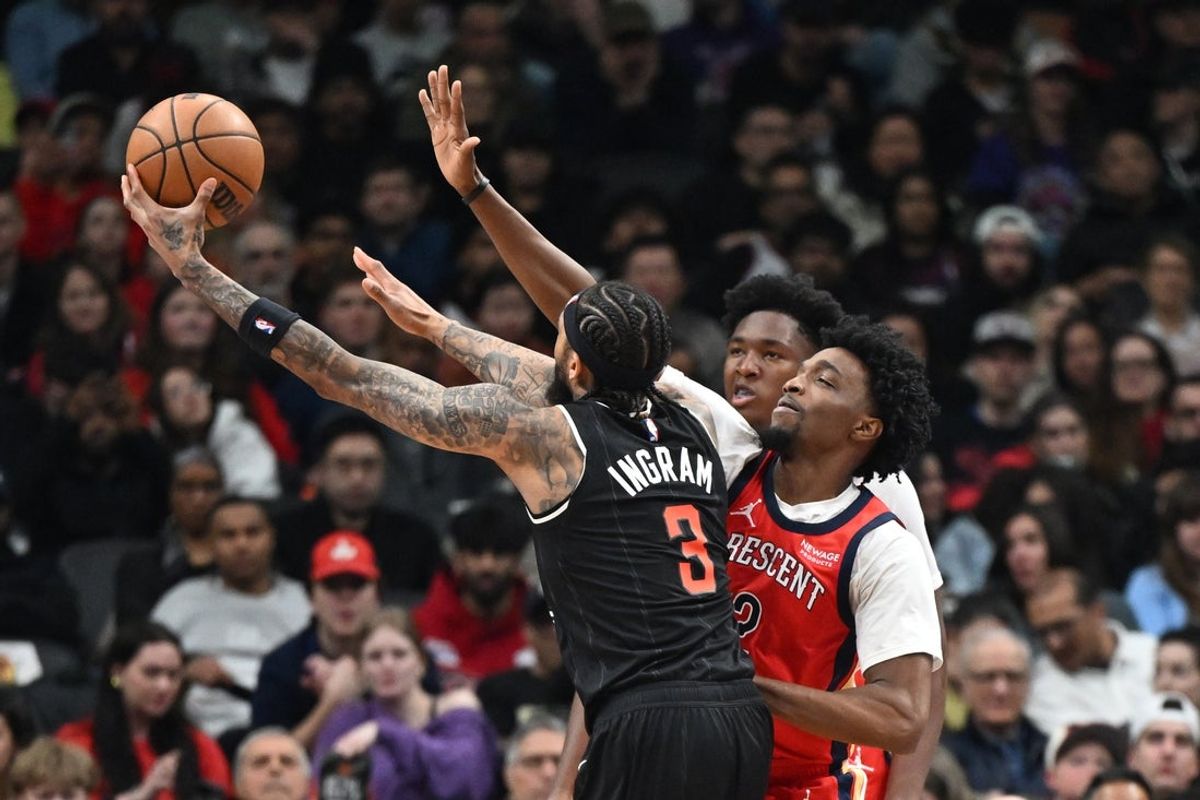 Mar 27, 2026; Toronto, Ontario, CAN;  Toronto Raptors forward Brandon Ingram (3) is fouled by New Orleans Pelicans forward Herb Jones (2) in the first half at Scotiabank Arena. Mandatory Credit: Dan Hamilton-Imagn Images