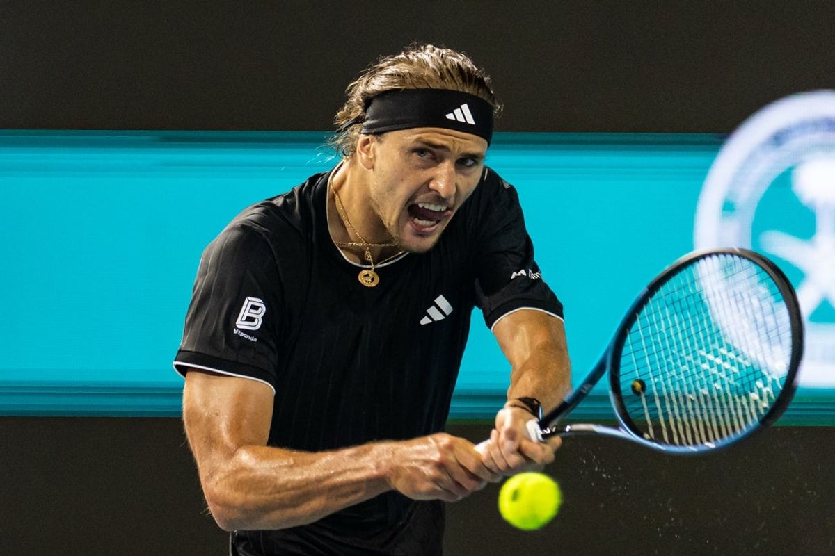 Mar 27, 2026; Miami Gardens, FL, USA;   Alexander Zverev of Germany hits a backhand against Jannik Sinner of Italy in the semi-finals of the men’s singles at the Miami Open at the Hard Rock Stadium. Mandatory Credit: Mike Frey-Imagn Images