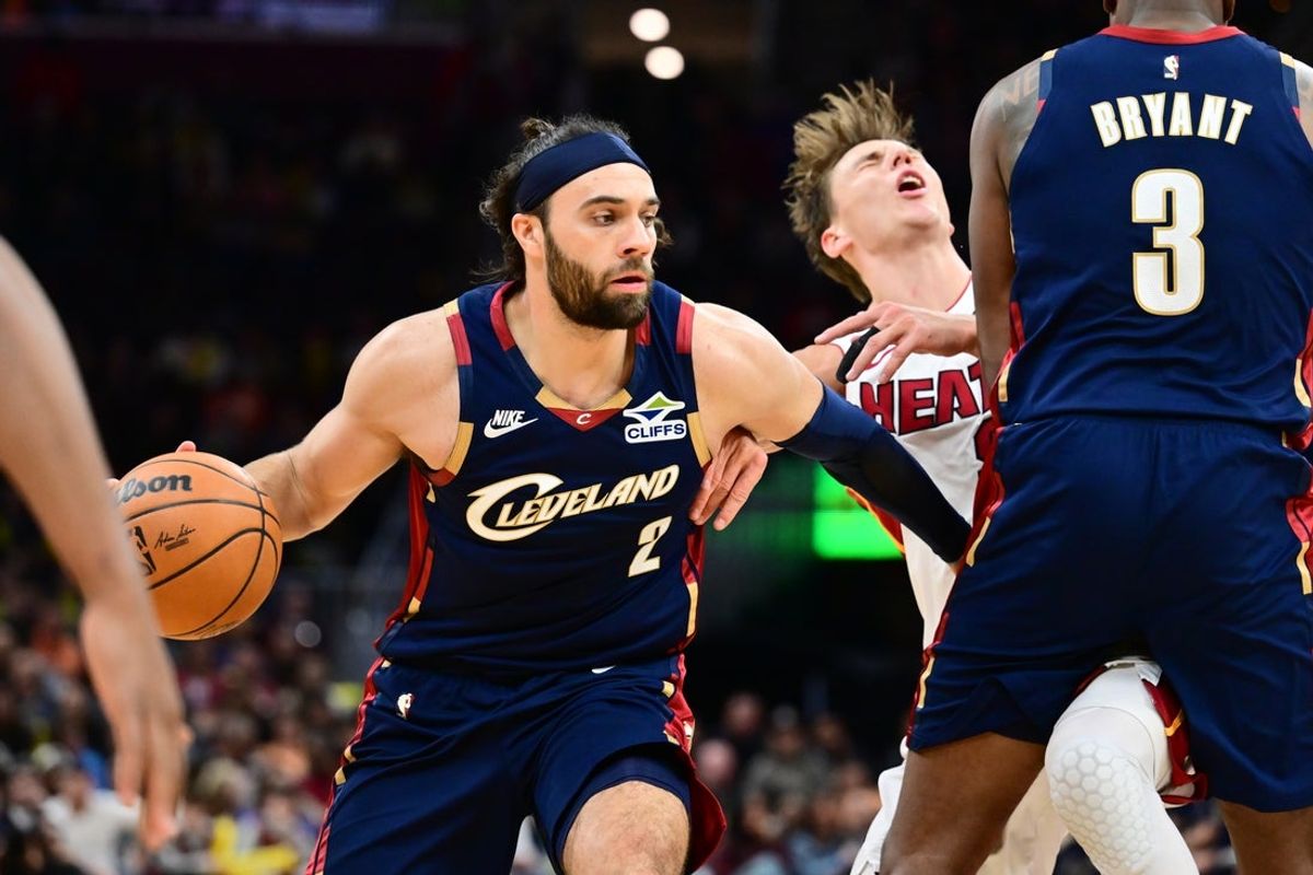 Mar 27, 2026; Cleveland, Ohio, USA; Cleveland Cavaliers guard Max Strus (2) drives to the basket off the pick of center Thomas Bryant (3) during the second half against the Miami Heat at Rocket Arena. Mandatory Credit: Ken Blaze-Imagn Images