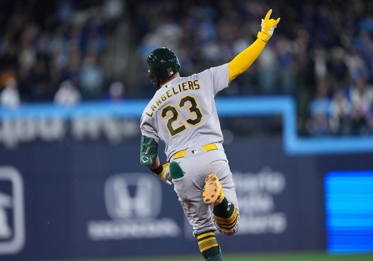 Mar 27, 2026; Toronto, Ontario, CAN; Athletics catcher Shea Langeliers (23) celebrates after hitting a home run against the Toronto Blue Jays during the ninth inning at Rogers Centre. Mandatory Credit: Nick Turchiaro-Imagn Images