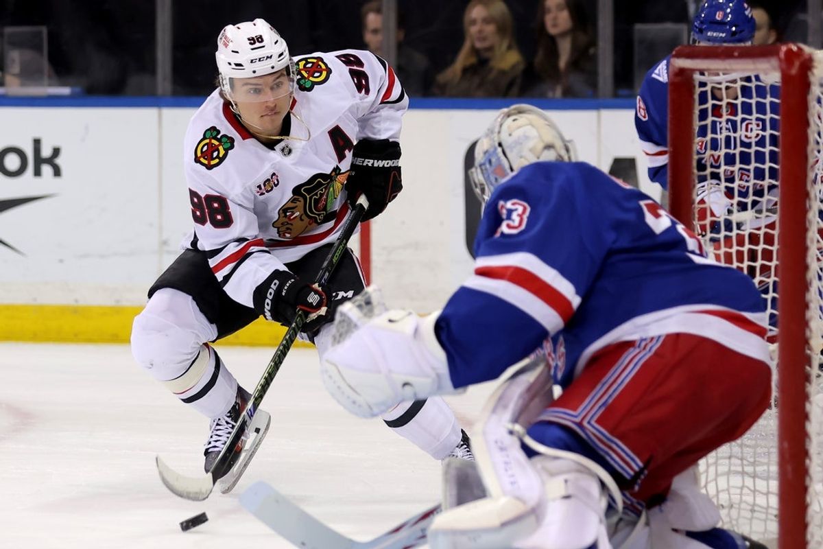 Mar 27, 2026; New York, New York, USA; Chicago Blackhawks center Connor Bedard (98) looks to shoot the puck against New York Rangers goaltender Dylan Garand (33) during the first period at Madison Square Garden. Mandatory Credit: Brad Penner-Imagn Images