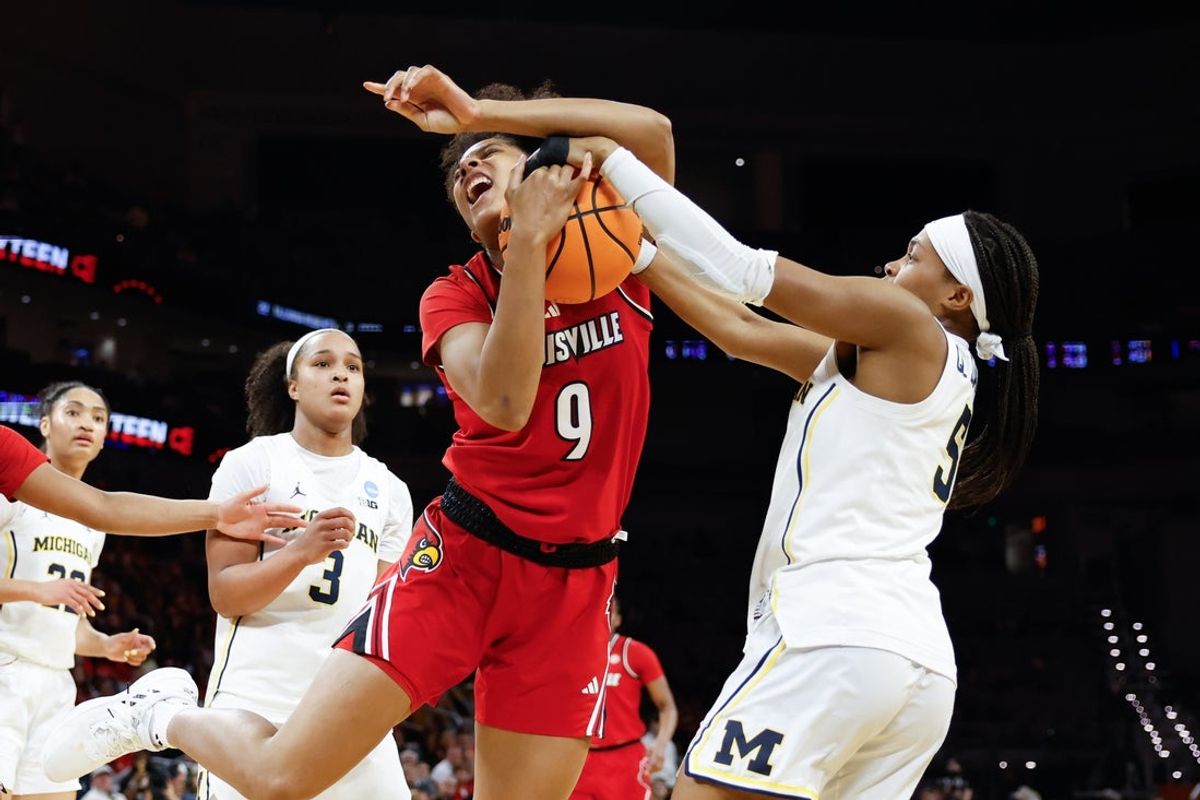 Mar 28, 2026; Fort Worth, TX, USA;  Louisville Cardinals forward Anaya Hardy (9) and Michigan Wolverines guard Brooke Q. Daniels (5) battle for the rebound during the first half at Dickies Arena. Mandatory Credit: Chris Jones-Imagn Images