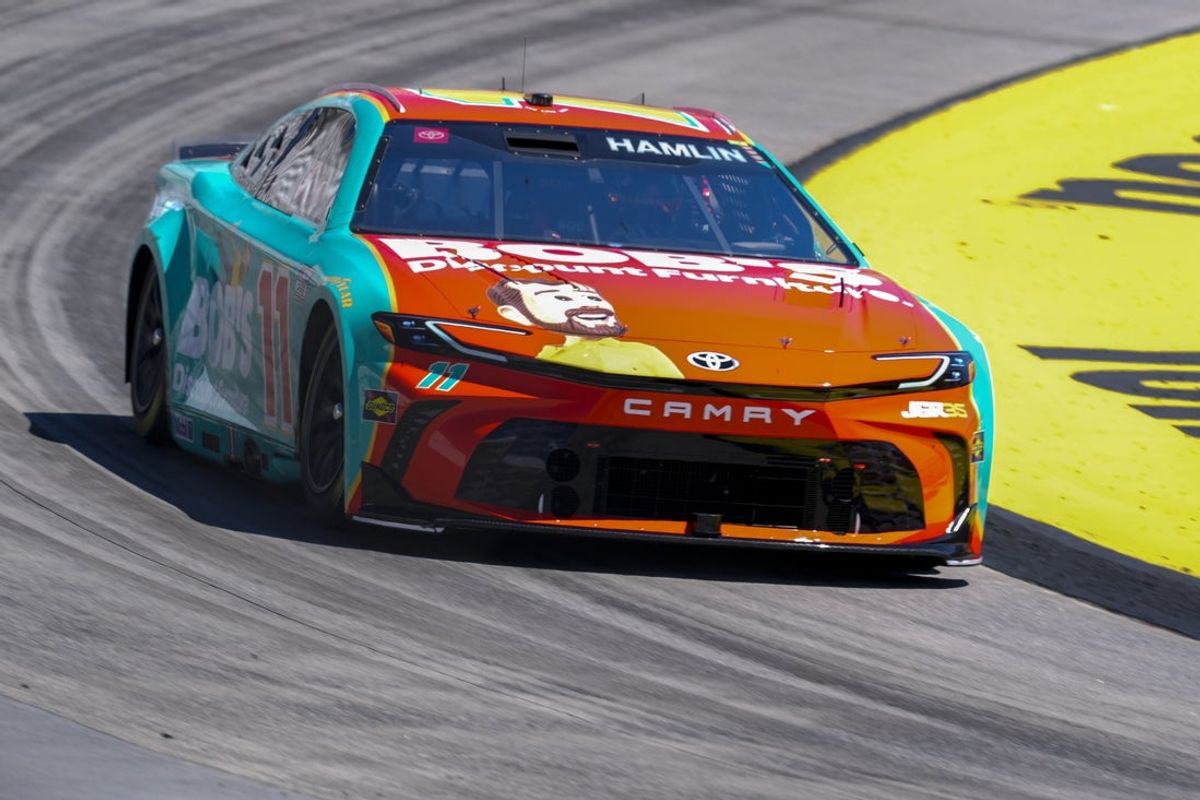 Mar 29, 2026; Martinsville, Virginia, USA; Joe Gibbs Racing driver Denny Hamlin (11) takes the pole during qualifying at Martinsville Speedway. Mandatory Credit: Jim Dedmon-Imagn Images