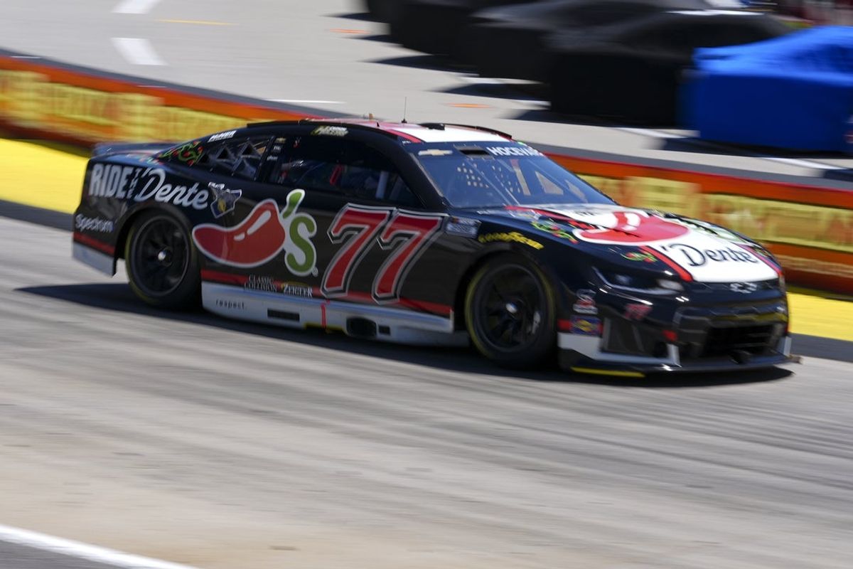 Mar 29, 2026; Martinsville, Virginia, USA; Spire Motorsports driver Carson Hocevar (77) during practice at Martinsville Speedway. Mandatory Credit: Jim Dedmon-Imagn Images