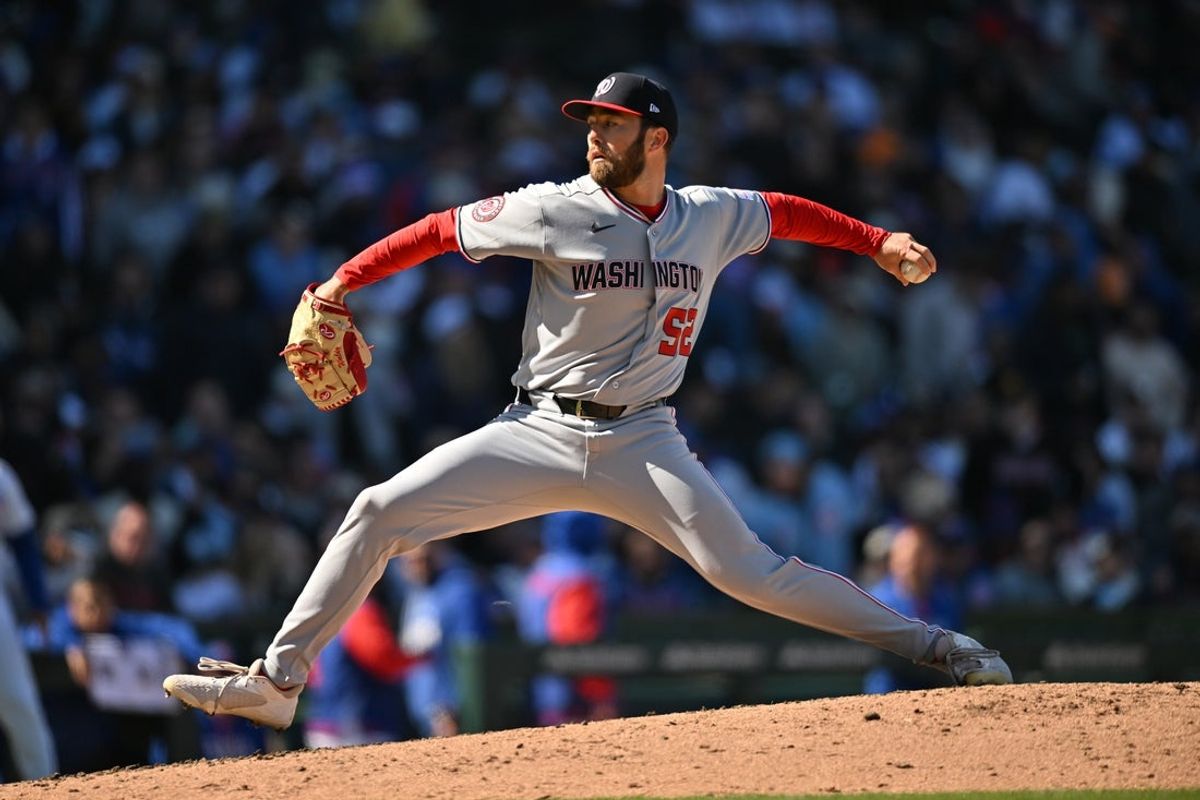 Mar 28, 2026; Chicago, Illinois, USA; Washington Nationals pitcher Ken Waldichuk (52) pitches against the Chicago Cubs during the sixth inning at Wrigley Field. Mandatory Credit: Patrick Gorski-Imagn Images