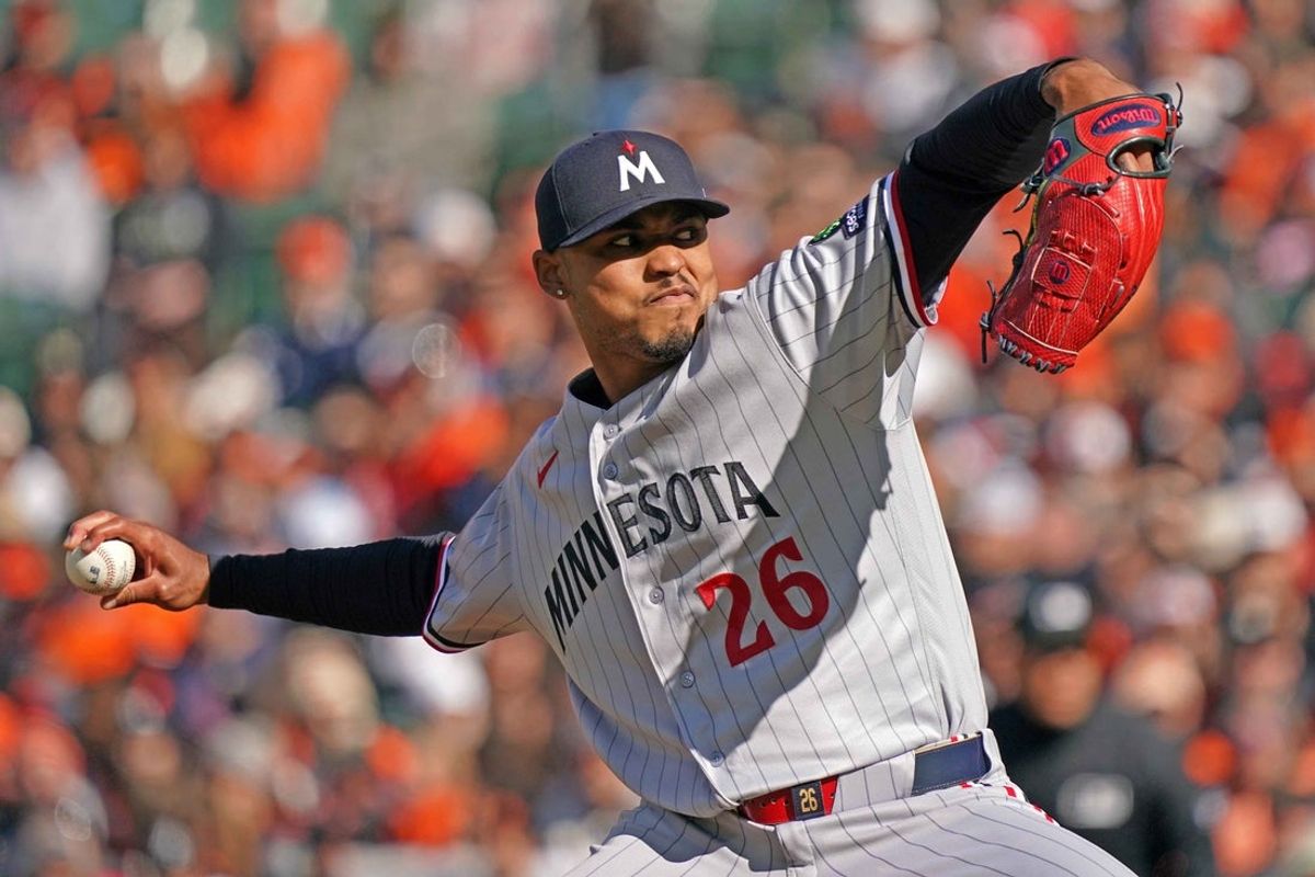 Mar 28, 2026; Baltimore, Maryland, USA; Minnesota Twins pitcher Taj Bradley (26) delivers during the first inning against the Baltimore Orioles at Oriole Park at Camden Yards. Mandatory Credit: Mitch Stringer-Imagn Images