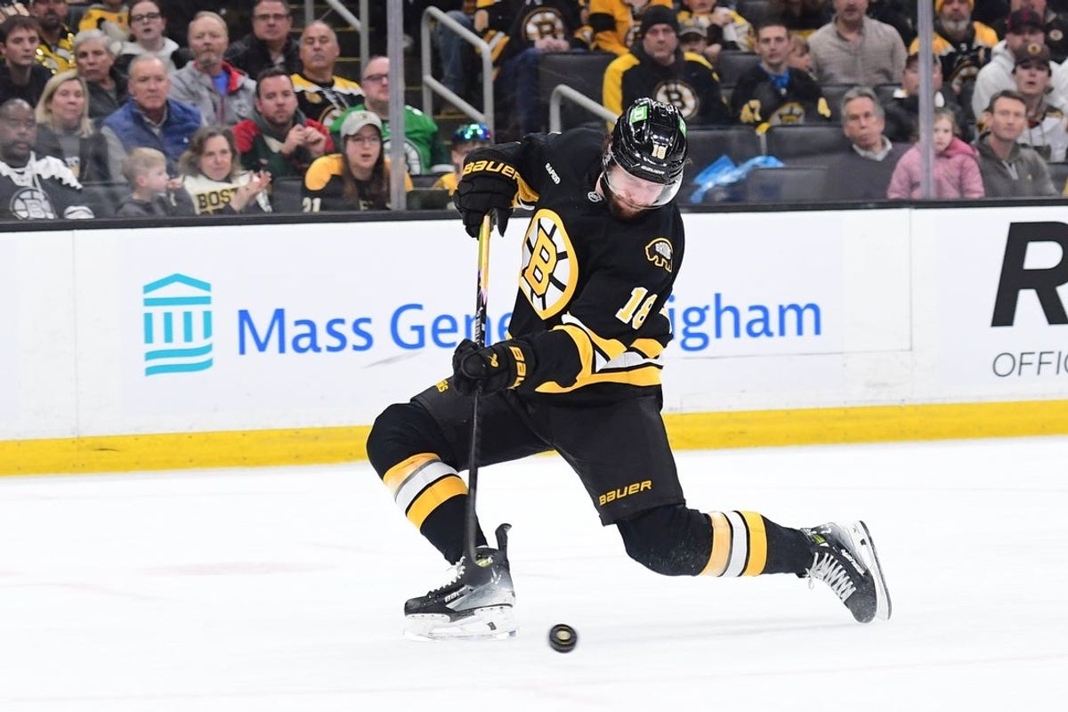Mar 28, 2026; Boston, Massachusetts, USA; Boston Bruins center Pavel Zacha (18) shoots and scores a goal during the first period against the Minnesota Wild at TD Garden. Mandatory Credit: Bob DeChiara-Imagn Images