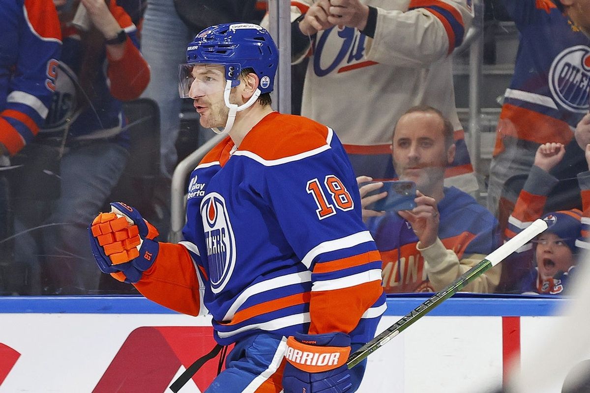 Mar 28, 2026; Edmonton, Alberta, CAN; Edmonton Oilers forward Zach Hyman (18) celebrates scoring a goal into an empty net to clinch a 4-2 win over the Anaheim Ducks at Rogers Place. Mandatory Credit: Perry Nelson-Imagn Images