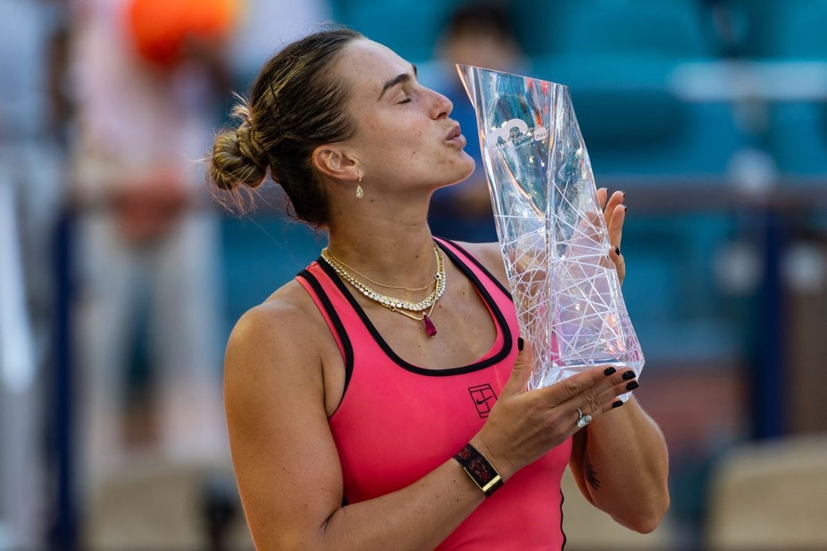 Mar 28, 2026; Miami Gardens, FL, USA; Aryna Sabalenka of Belarus poses with the Butch Buchholz Championship trophy after defeating Coco Gauff of the United States in the final of the women’s singles at the Hard Rock Stadium. Mandatory Credit: Mike Frey-Imagn Images