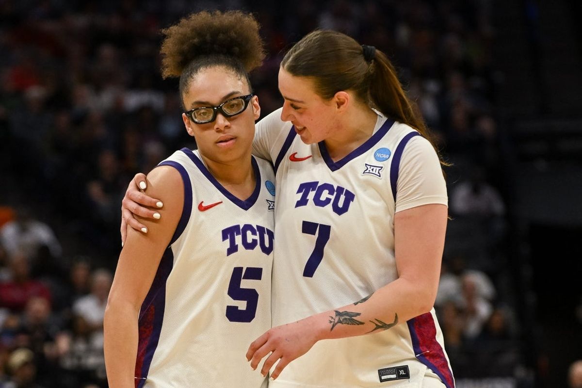 Mar 28, 2026; Sacramento, CA, USA; Texas Christian University Horned Frogs guard Olivia Miles (5) and forward Marta Suárez (7) embrace after a called foul during the second quarter of the game against the Virginia Cavaliers in the Sweet Sixteen game of the Sacramento Regional 4 of the women's 2026 NCAA Tournament at Golden 1 Center. Mandatory Credit: Ed Szczepanski-Imagn Images