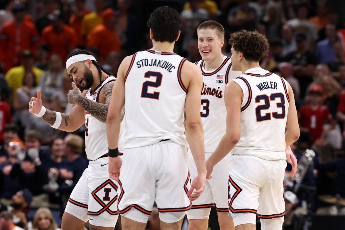 Mar 28, 2026; Houston, TX, USA; Illinois Fighting Illini guard Kylan Boswell (4) and guard Andrej Stojakovic (2) and forward Ben Humrichous (3) and guard Keaton Wagler (23) react in the second half against the Iowa Hawkeyes during an Elite Eight game of the South Regional of the men's 2026 NCAA Tournament at Toyota Center. Mandatory Credit: Troy Taormina-Imagn Images