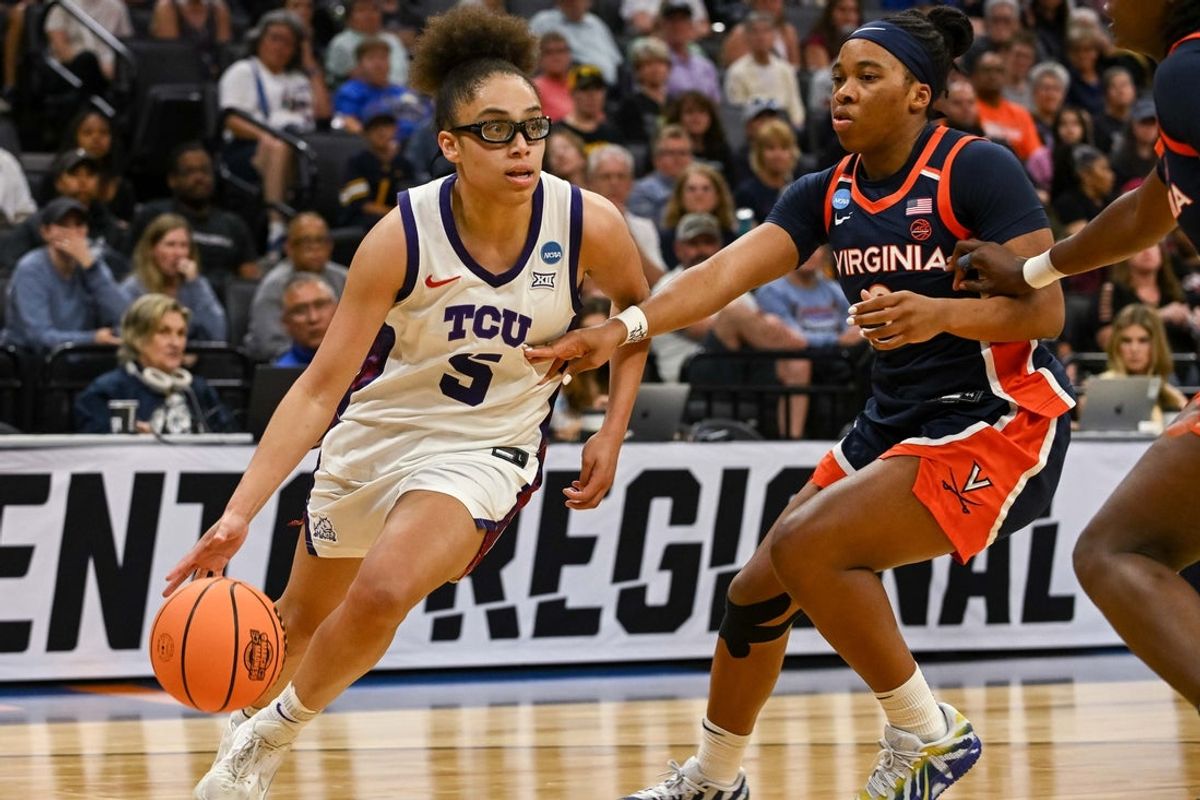 Mar 28, 2026; Sacramento, CA, USA; Texas Christian University Horned Frogs guard Olivia Miles (5) drives against Virginia Cavaliers guard Gabby White (3) during the third quarter in the Sweet Sixteen game of the Sacramento Regional 4 of the women's 2026 NCAA Tournament at Golden 1 Center. Mandatory Credit: Ed Szczepanski-Imagn Images