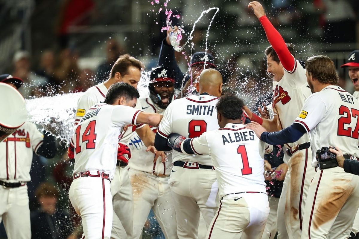 Mar 28, 2026; Cumberland, Georgia, USA; Atlanta Braves first baseman Dominic Smith (8) hits a walk-off grand slam against the Kansas City Royals in the ninth inning at Truist Park. Mandatory Credit: Mady Mertens-Imagn Images