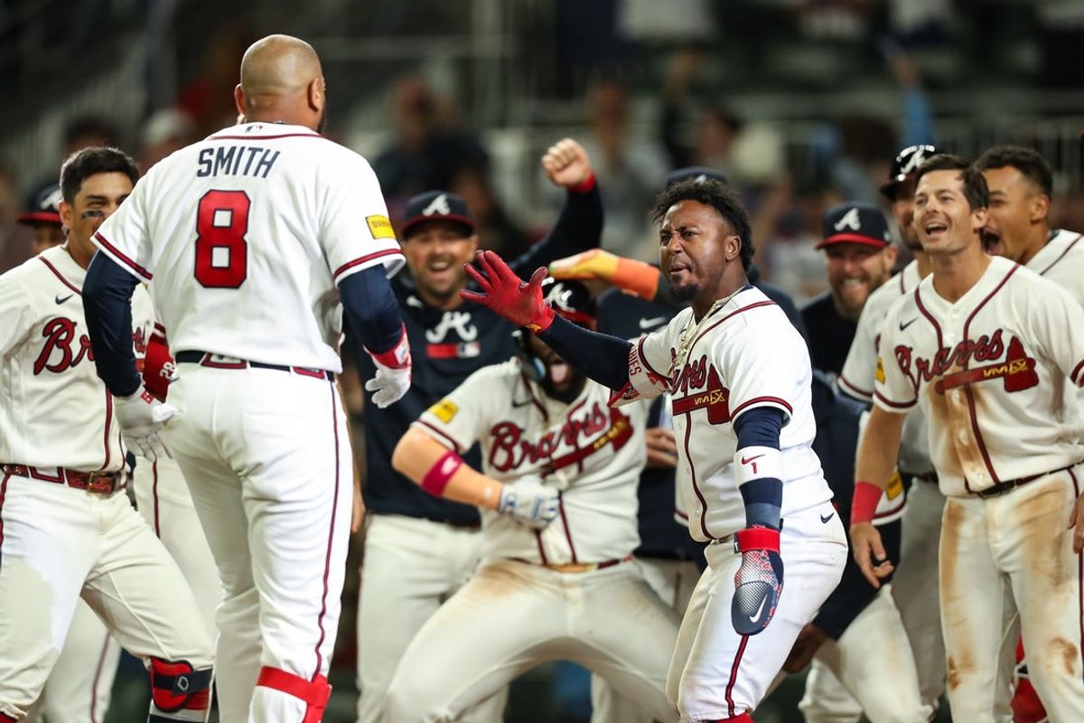Mar 28, 2026; Cumberland, Georgia, USA; Atlanta Braves first baseman Dominic Smith (8) hits a walk-off grand slam against the Kansas City Royals in the ninth inning at Truist Park. Mandatory Credit: Mady Mertens-Imagn Images