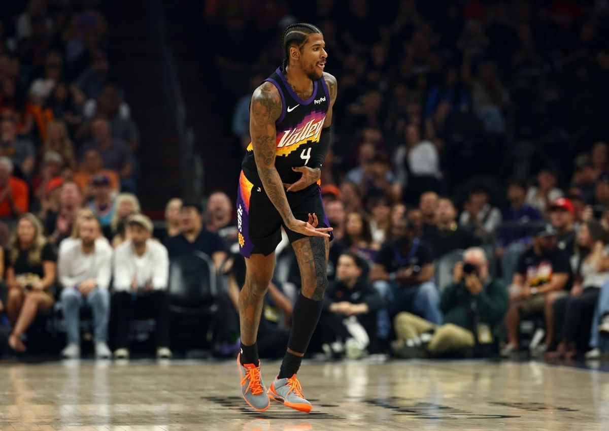 Mar 28, 2026; Phoenix, Arizona, USA; Phoenix Suns guard Jalen Green (4) celebrates a shot against the Utah Jazz in the first half at Mortgage Matchup Center. Mandatory Credit: Mark J. Rebilas-Imagn Images