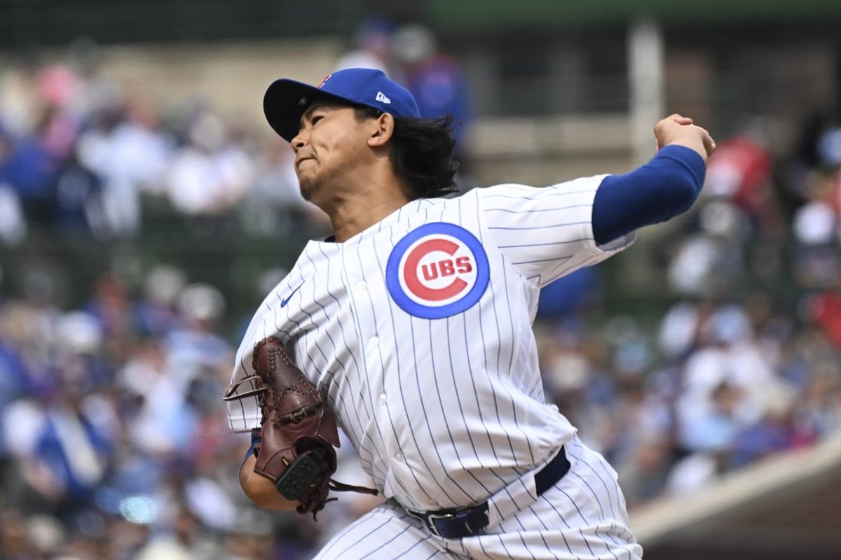 Mar 29, 2026; Chicago, Illinois, USA;  Chicago Cubs pitcher Shota Imanaga (18) delivers during the first inning against the Washington Nationals at Wrigley Field. Mandatory Credit: Matt Marton-Imagn Images