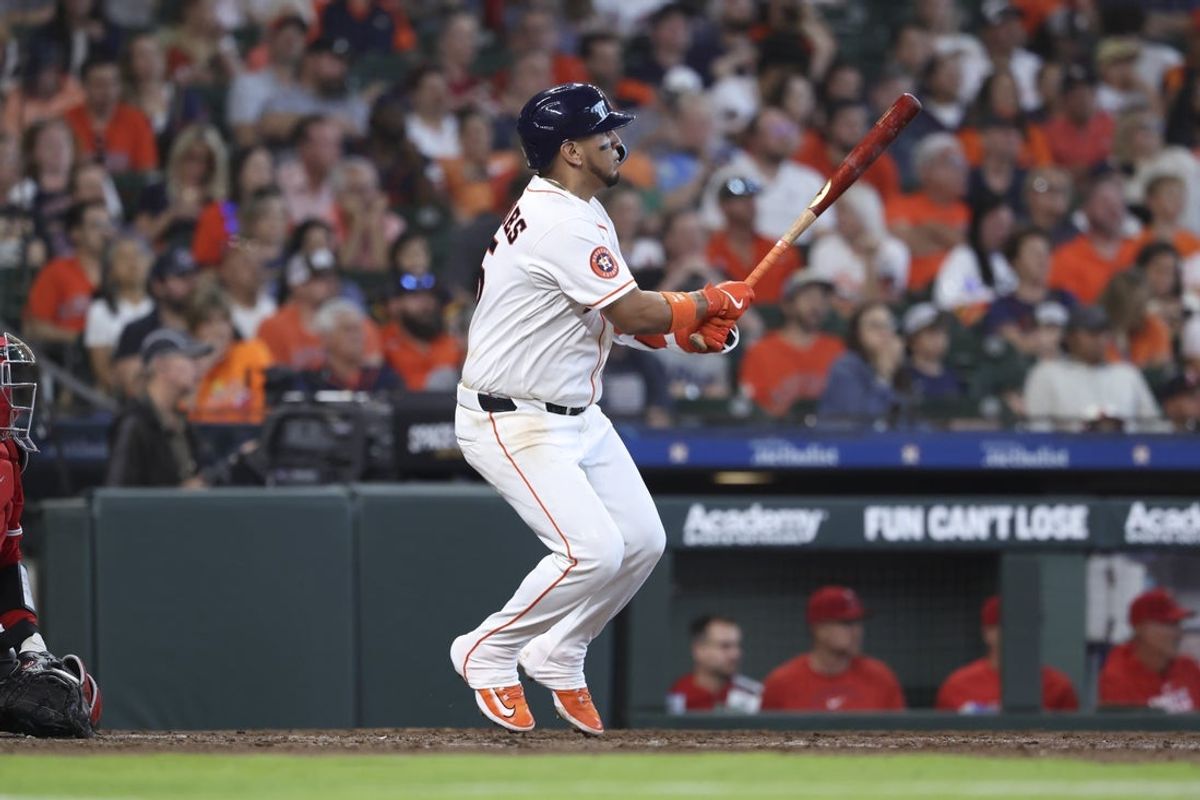 Mar 29, 2026; Houston, Texas, USA; Houston Astros second baseman Isaac Paredes (15) hits a double during the fifth inning against the Los Angeles Angels at Daikin Park. Mandatory Credit: Troy Taormina-Imagn Images