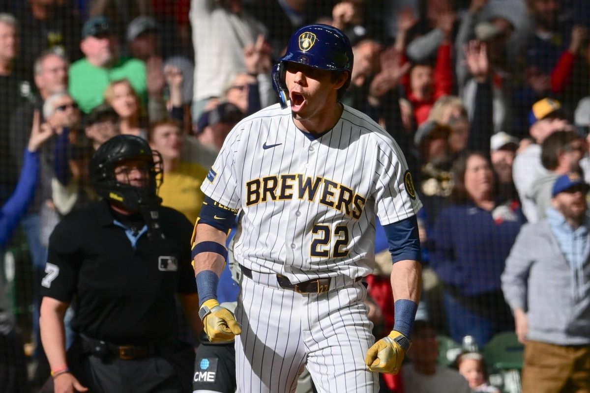 Mar 29, 2026; Milwaukee, Wisconsin, USA;  Milwaukee Brewers designated hitter Christian Yelich (22) reacts after hitting a three-run home run in the eighth inning against the Chicago White Sox at American Family Field. Mandatory Credit: Benny Sieu-Imagn Images