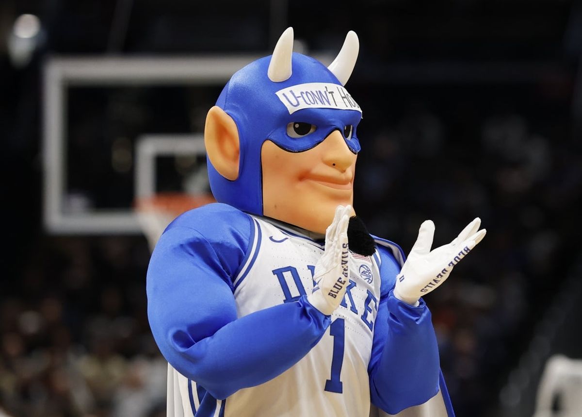 Mar 29, 2026; Washington, DC, USA; The Duke Blue Devils mascot performs during a timeout against the UConn Huskies in the first half during an Elite Eight game of the East Regional of the men's 2026 NCAA Tournament at Capital One Arena. Mandatory Credit: Geoff Burke-Imagn Images