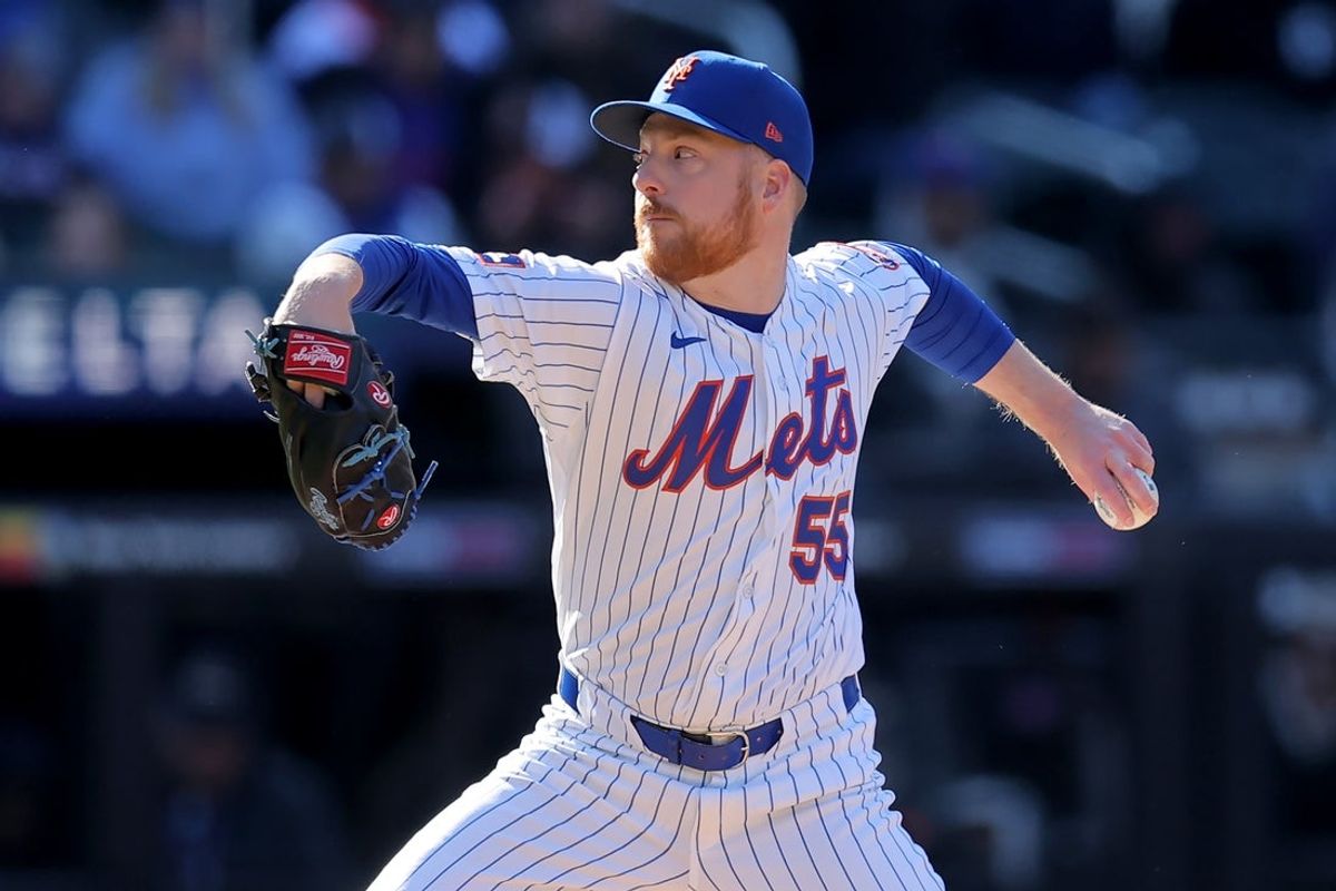 Mar 29, 2026; New York City, New York, USA; New York Mets relief pitcher Richard Lovelady (55) pitches against the Pittsburgh Pirates during the tenth inning at Citi Field. Mandatory Credit: Brad Penner-Imagn Images