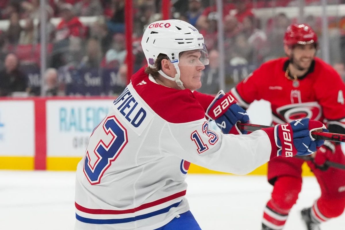 Mar 29, 2026; Raleigh, North Carolina, USA;  Montreal Canadiens right wing Cole Caufield (13) scores a goal against the Carolina Hurricanes during the second period at Lenovo Center. Mandatory Credit: James Guillory-Imagn Images