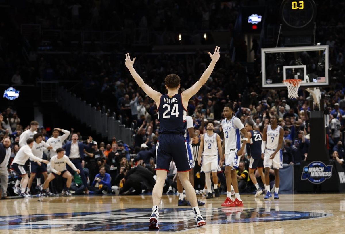 Mar 29, 2026; Washington, DC, USA; UConn Huskies guard Braylon Mullins (24) celebrates after making the game-winning three-point basket against the Duke Blue Devils in the second half during an Elite Eight game of the East Regional of the men's 2026 NCAA Tournament at Capital One Arena. Mandatory Credit: Geoff Burke-Imagn Images