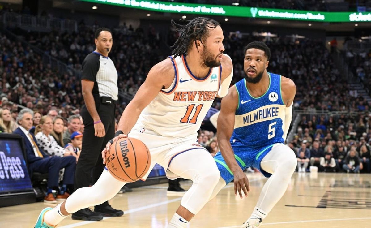Dec 5, 2023; Milwaukee, Wisconsin, USA; New York Knicks guard Jalen Brunson (11) drives to the basket against Milwaukee Bucks guard Malik Beasley (5) in the first half at Fiserv Forum.