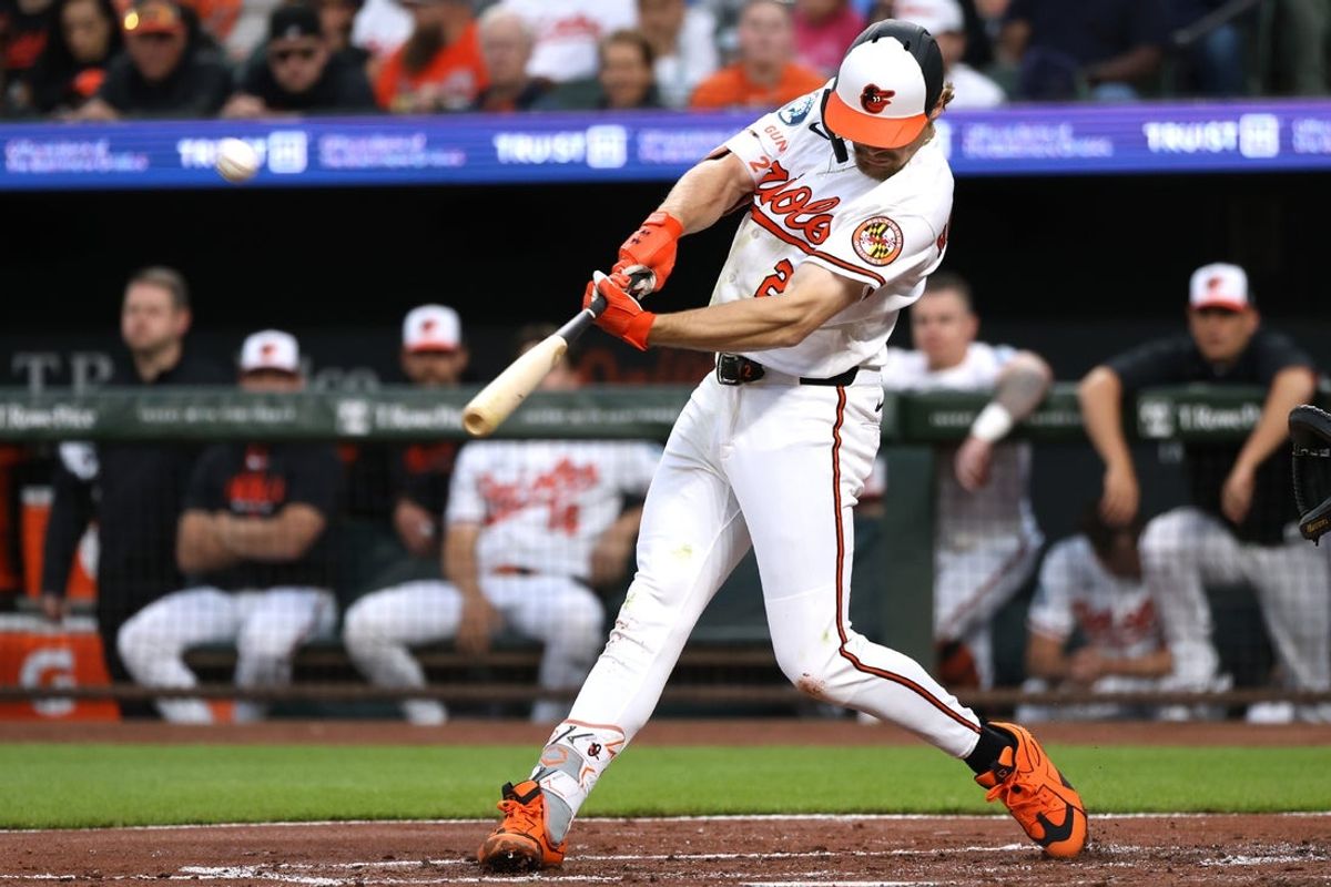 Mar 30, 2026; Baltimore, Maryland, USA; Baltimore Orioles shortstop Gunnar Henderson (2) hits a home run during the first inning against the Texas Rangers at Oriole Park at Camden Yards. Mandatory Credit: Daniel Kucin Jr.-Imagn Images