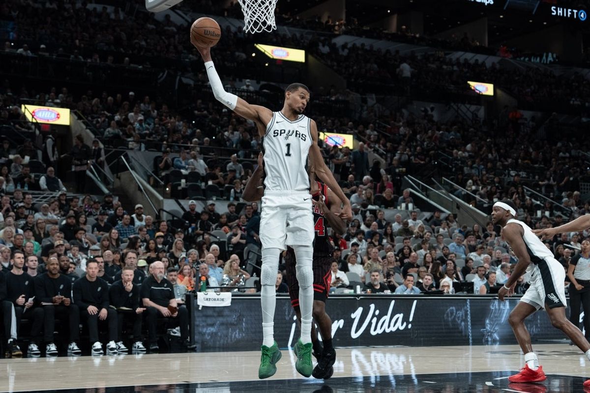 Mar 30, 2026; San Antonio, Texas, USA;  San Antonio Spurs forward Victor Wembanyama (1) rebounds in the first half against the Chicago Bulls at Frost Bank Center. Mandatory Credit: Daniel Dunn-Imagn Images