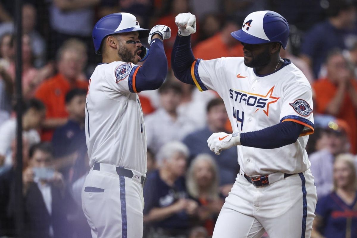 Mar 30, 2026; Houston, Texas, USA; Houston Astros designated hitter Yordan Alvarez (44) celebrates with shortstop Carlos Correa (1) after hitting a home run during the third inning against the Boston Red Sox at Daikin Park. Mandatory Credit: Troy Taormina-Imagn Images